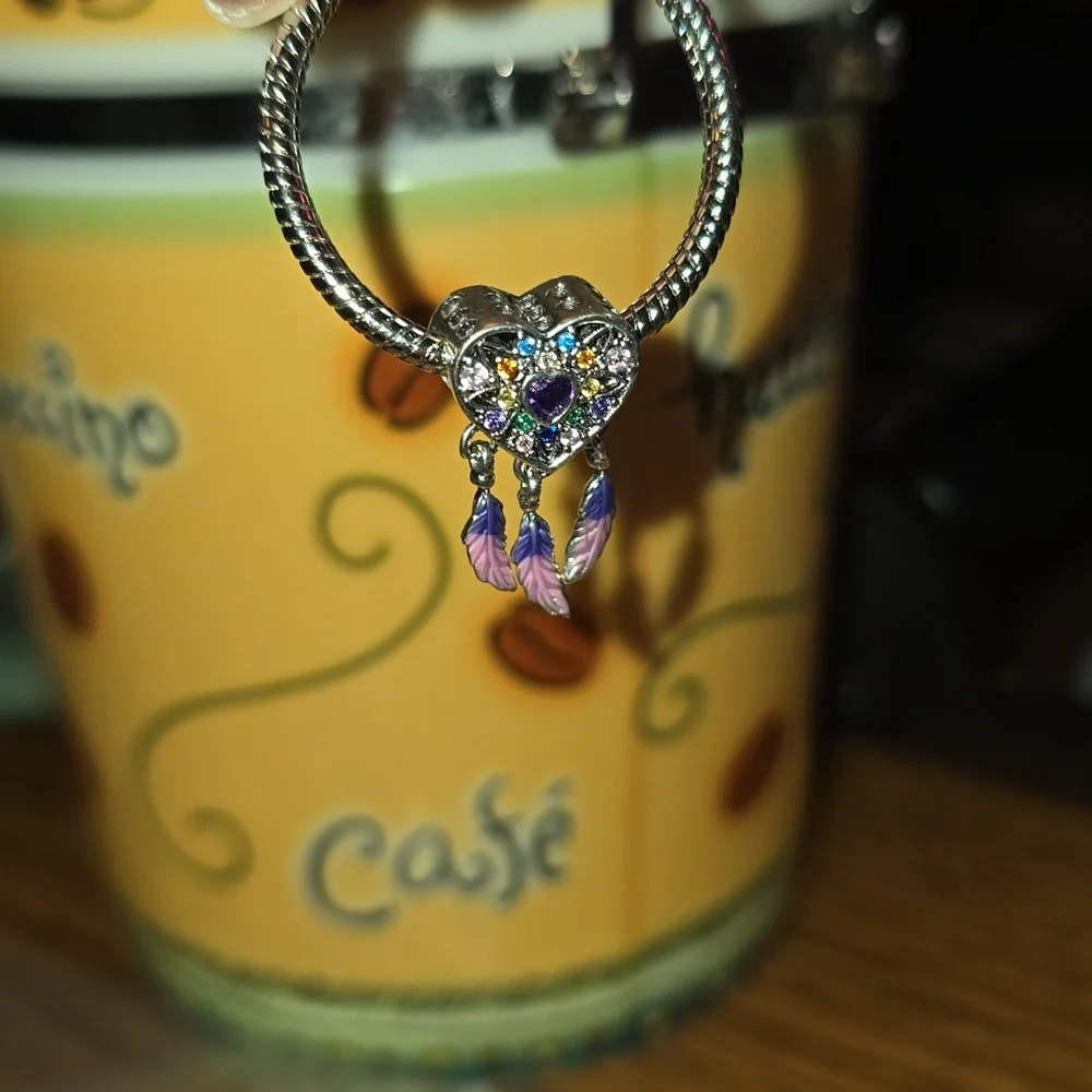 Beautiful heart pendant w/center purple stone & various stones! Feathers danging - Picture 1 of 4
